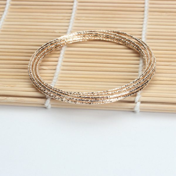 Multi Layer Ten Ring Interlocking Bracelet - Image 4